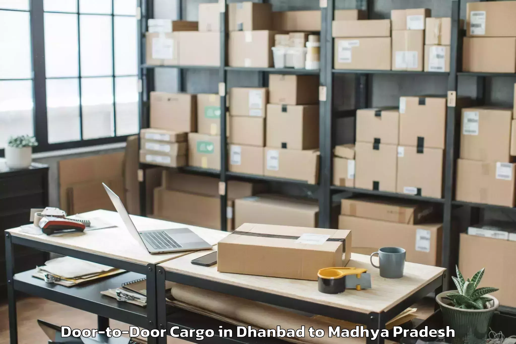 Leading Dhanbad to Ganj Basoda Door To Door Cargo Provider